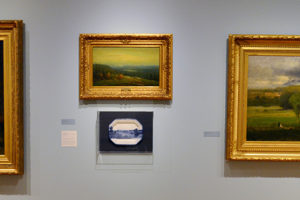 Mount Holyoke College Art Museum:
(right) George Inness, American (1825-1894), "Saco Ford: Conway Meadows" 1876,
oil on canvas.
(center top) Homer Dodge Martin, American (1836-1897), "A Glimpse of Lake Placid," 1887, oil on canvas.
(center bottom) Paul Scott, "Scott's Cumbrian Blue(s), American Scenery, Hudson River, Indian Point No. 4, " 2015, ceramic transfer decal. 
(left) Albert Bierstadt, American (1830-1902), "Hetch Hetchy Canyon," 1875, oil on canvas