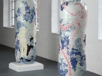 Sin-ying Ho, left: "One World, Many Peoples No. 2" (77 x 23.25") and right: "Temptation - Life of Goods No. 2" (68 x 23.5") 2010, porcelain, cobalt pigment, underglaze, decal, glaze.