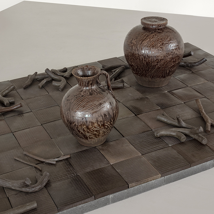 Linda Sikora, "ground II", 2022, broken box; small tea pot; white tile, 8.5 x 11 x 11"; Installation with wall shelf: 12 x 12"